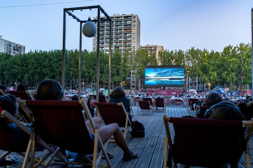 Young Parisians enjoy a relaxing time out on the city's Bassin de la Villette as part of the city's 