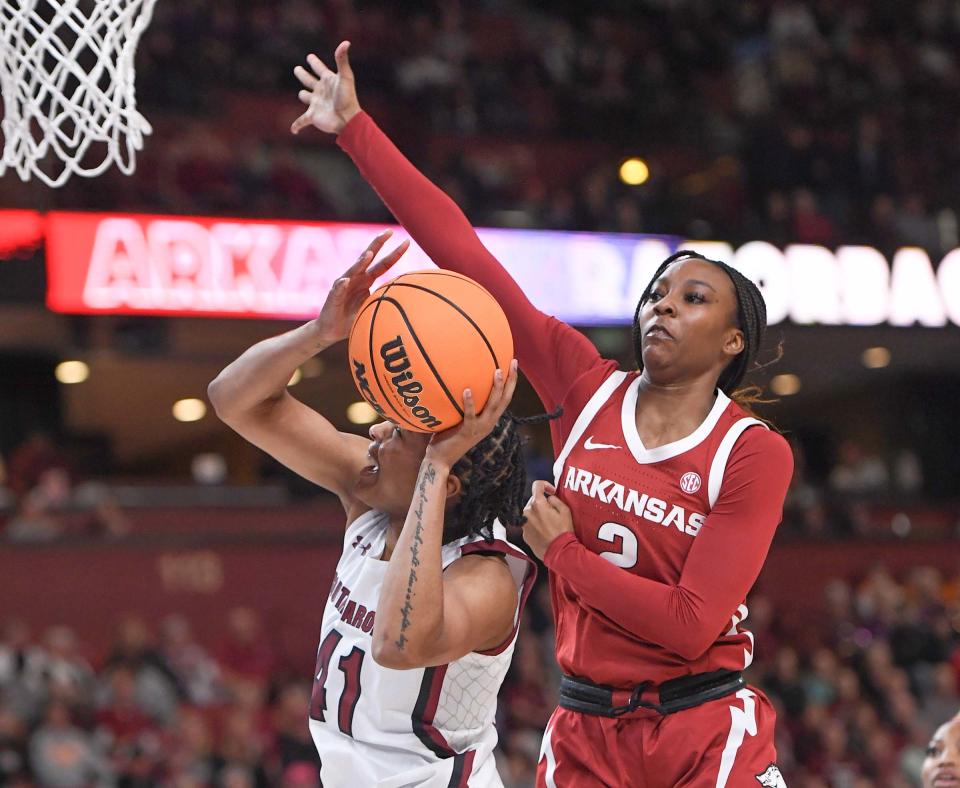 South Carolina guard Kierra Fletcher (41) shoots near Arkansas guard Samara Spencer (2) during the first quarter of the SEC Women's Basketball Tournament at Bon Secours Wellness Arena in Greenville, S.C. Friday, March 3, 2023. 