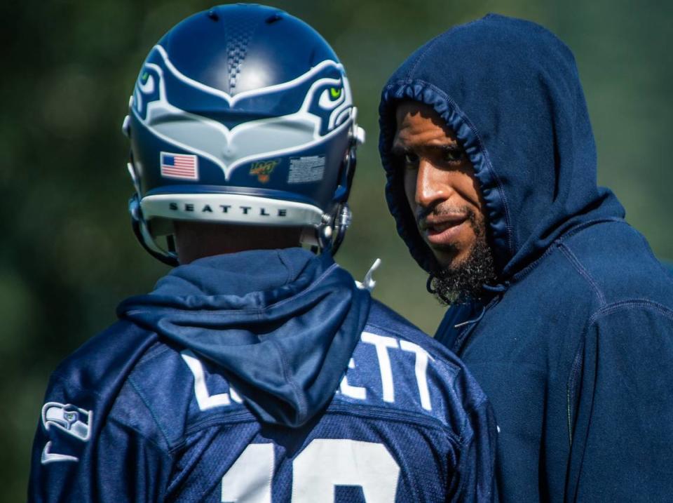 Bobby Wagner and Tyler Lockett chat during the Seattle Seahawks training camp at the Virginia Mason Athletic Center in Renton, Wash., on Thursday, July 25, 2019. Joshua Bessex/joshua.bessex@gateline.com