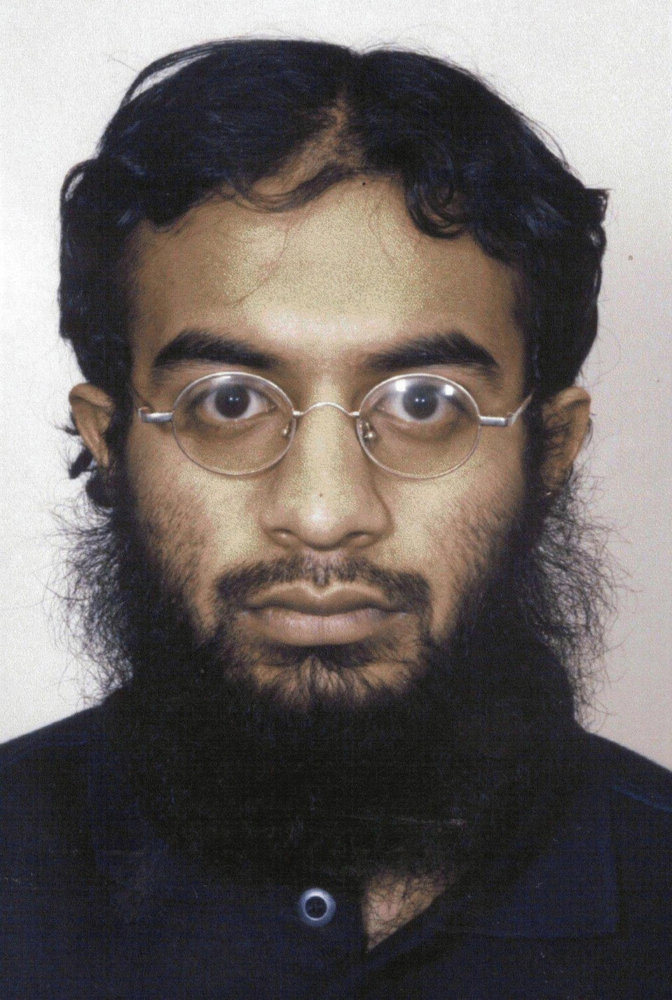 FILE - This undated file photo provided by the Metropolitan Police in London shows Saajid Badat, sentenced in 2005 after admitting he conspired to blow up a U.S.-bound plane in 2001 with explosives hidden in a shoe. On Monday, March 17, 2014, a federal judge in New Haven, Conn., granted the request by prosecutors to have a witness testify by video from Britain in the July sentencing of two British citizens, Babar Ahmad and Syed Talha Ahsan, who pleaded guilty in Connecticut to supporting terrorists through websites. The witness, not named in court papers but fits the description of Badat, is expected to testify that Ahmad sent him to Afghanistan to train for violent jihad and that he moved on from Ahmad and was trained by al-Qaida members for the failed shoe bomb plot to bring down an airplane. (AP Photo/Metropolitan Police, File)