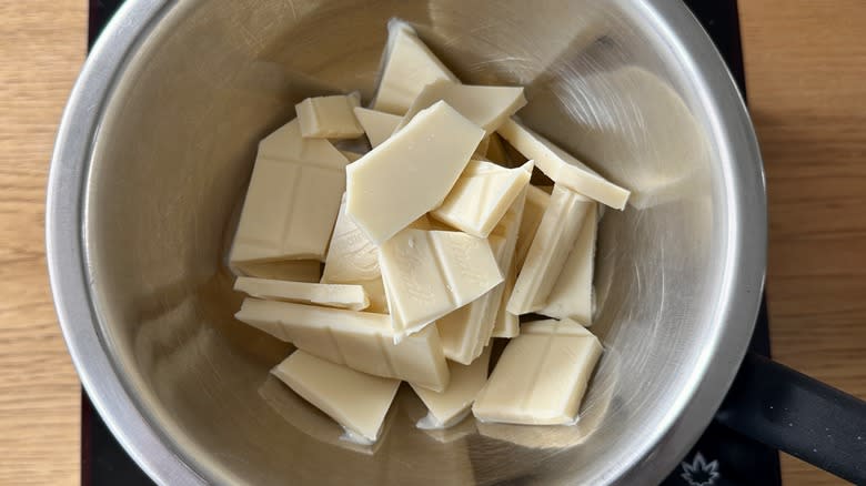 Chopped white chocolate in bowl