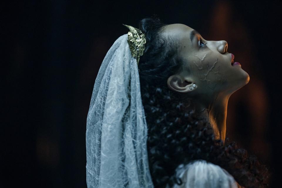 A bride looking up at the sky