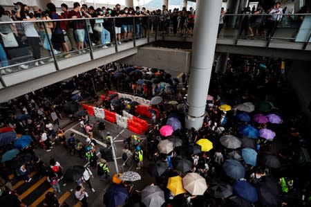 FILE PHOTO: Barriers set up by anti-extradition bill protesters are seen during a protest outside the airport in Hong Kong