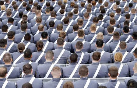 Members of the graduating class listen to proceedings during commencement ceremony at the United States Military Academy at West Point, New York, May 28, 2014. REUTERS/Kevin Lamarque