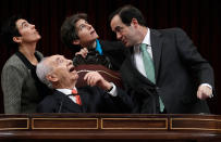 <p>Israel’s President Shimon Peres (seated) looks up at the bullet holes in the ceiling from the February 23, 1981 coup attempt next to Parliament Chairman Jose Bono (R) during his visit to the Spanish parliament in Madrid on Feb. 22, 2011. (REUTERS/Andrea Comas) </p>