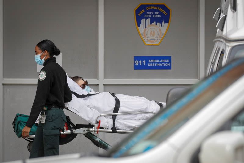 A patient arrives outside Maimonides Medical Center, as the spread of the coronavirus disease (COVID-19) continues, in Brooklyn, New York