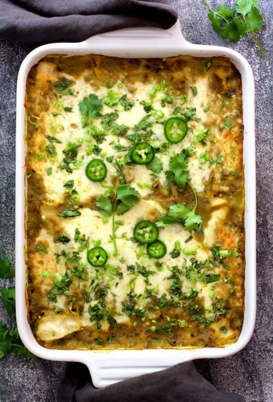 <p>From a Chef's Kitchen</p><p>These lima bean and potato enchiladas are spiced up with hatch green chile sauce and your enchiladas will never be the same again!</p><p><strong>Get the recipe: <a href="https://www.fromachefskitchen.com/lima-bean-potato-enchiladas-hatch-green-chile-sauce/" rel="nofollow noopener" target="_blank" data-ylk="slk:Lima Bean and Potato Enchiladas with Hatch Green Chile Sauce;elm:context_link;itc:0;sec:content-canvas" class="link ">Lima Bean and Potato Enchiladas with Hatch Green Chile Sauce</a></strong></p>