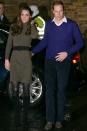 <p><em>December 21, 2011 —</em> For a visit to a charity just before Christmas, Kate wore a green sweater dress with a black belt and knee-high boots.</p>