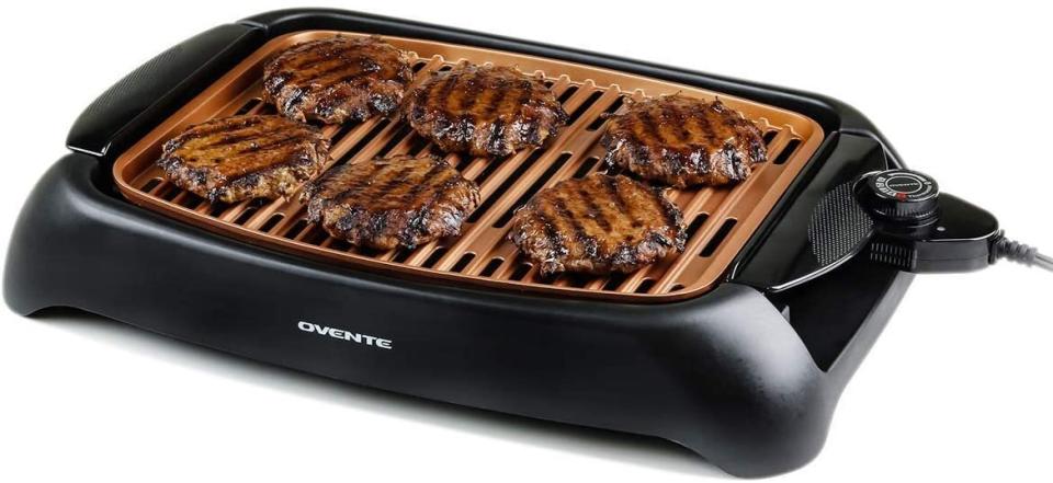 This grill has a removable nonstick cooking plate, which makes for easy cleanup. <a href="https://amzn.to/2YKCRpC" target="_blank" rel="noopener noreferrer">Find it for $30 at Amazon</a>.