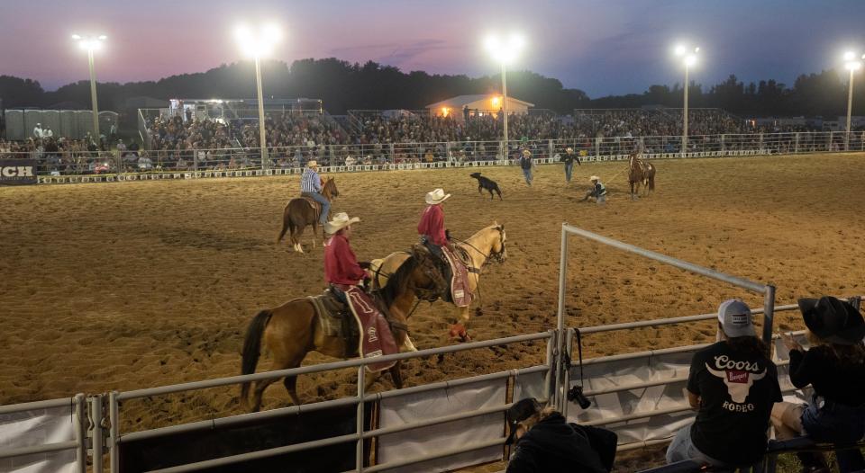 The sun sets during the Falcon Frontier Rodeo on Sept. 8,  at the University of Wisconsin-River Falls. Since 1964, UW-River Falls has hosted a college rodeo, drawing college competitors from across the Midwest. Part of the National Intercollegiate Rodeo Association, it brings in about 300 competitors. There are nine main events: bareback riding, breakaway roping, tie-down roping, saddle bronc riding, team roping, goat tying, steer wrestling, barrel racing and bull riding. This rodeo is the first of five for the team's fall season. The event dovetails with the school's nationally recognized horse science program, the first of its kind in a public university in the Upper Midwest.