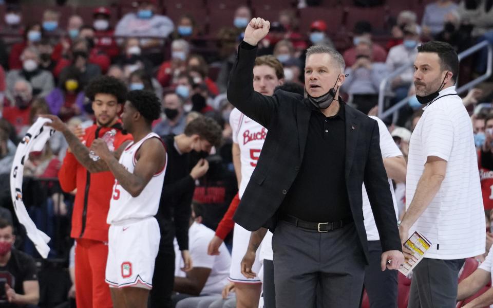 Ohio State head coach Chris Holtmann gestures to players during the first half of the Ohio State vs. Penn State men's basketball game Sunday, January 16, 2022 at the Value City Arena in the Schottenstein Center.