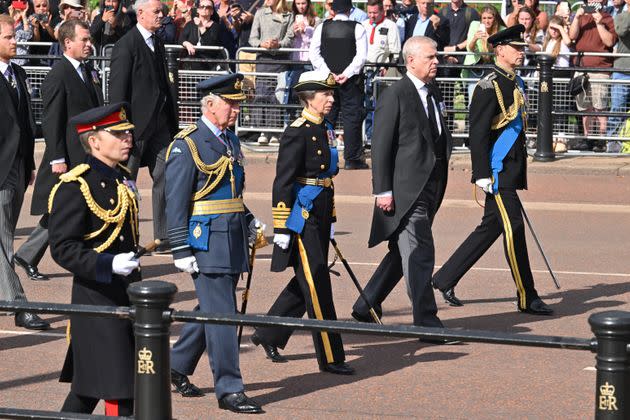 King Charles III, Princess Anne, Prince Andrew, and Prince Edward, walk behind the coffin during the procession for the lying in state of Queen Elizabeth II on Sep. 14 in London. (Photo: Leon Neal via Getty Images)