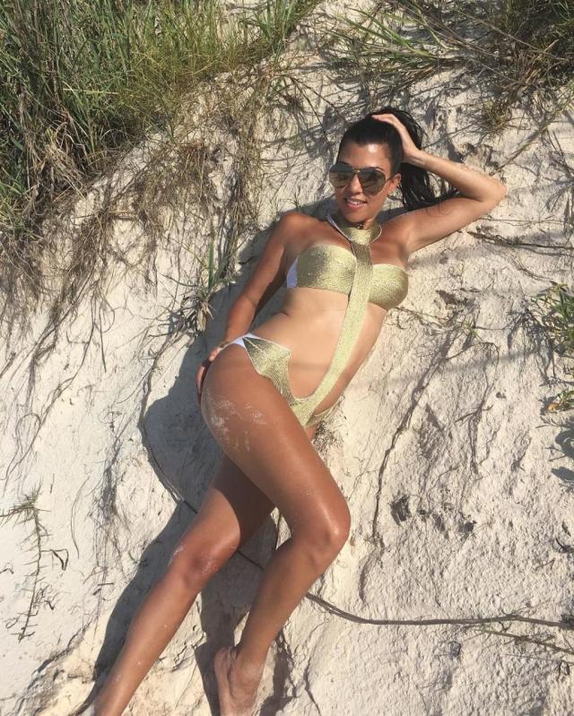 Gisele Bundchen showcases her supermodel frame in patterned swimsuit during  beach photoshoot