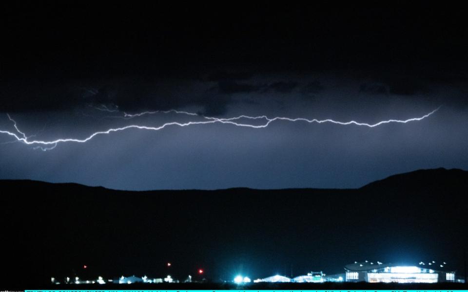 Lightning flashes over Spaceport America prior to the launch of Virgin Galactics SpaceShipTwo Unity in Truth Or Consequences, New Mexico. - David Lienemann/Getty Images