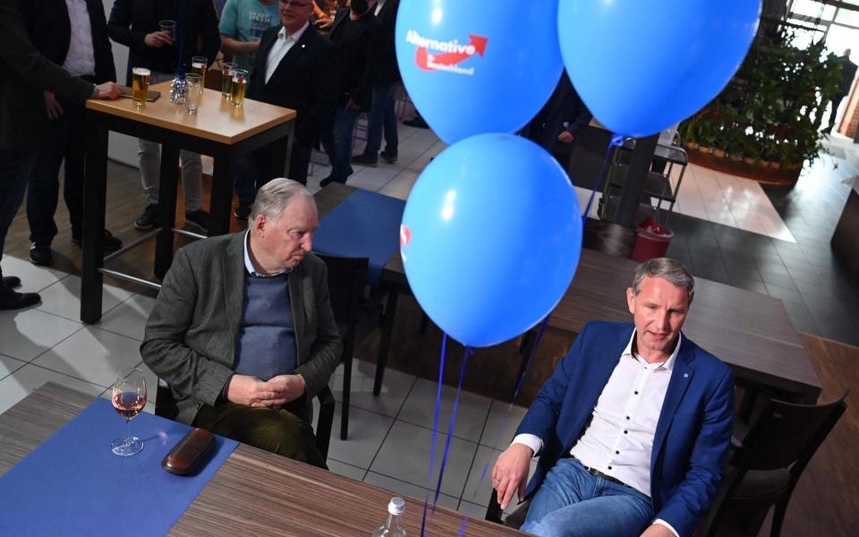 Alexander Gauland (L), parliamentary group co-leader of Germany's far-right Alternative for Germany (AfD) party, and Thuringia's AfD leader Bjoern Hoecke sit at the party's venue as they await the results in the regional elections in the German state of Saxony-Anhalt, in Magdeburg, eastern Germany, on June 6, 2021, during. - Germans in the eastern state of Saxony-Anhalt headed to the polls on June 6, with the far-right posing a tough challenge to Chancellor Merkel's conservatives in the final major test before the first general election in 16 years not to feature the veteran chancellor. (Photo by John MACDOUGALL / AFP) (Photo by JOHN MACDOUGALL/AFP via Getty Images) - JOHN MACDOUGALL/AFP