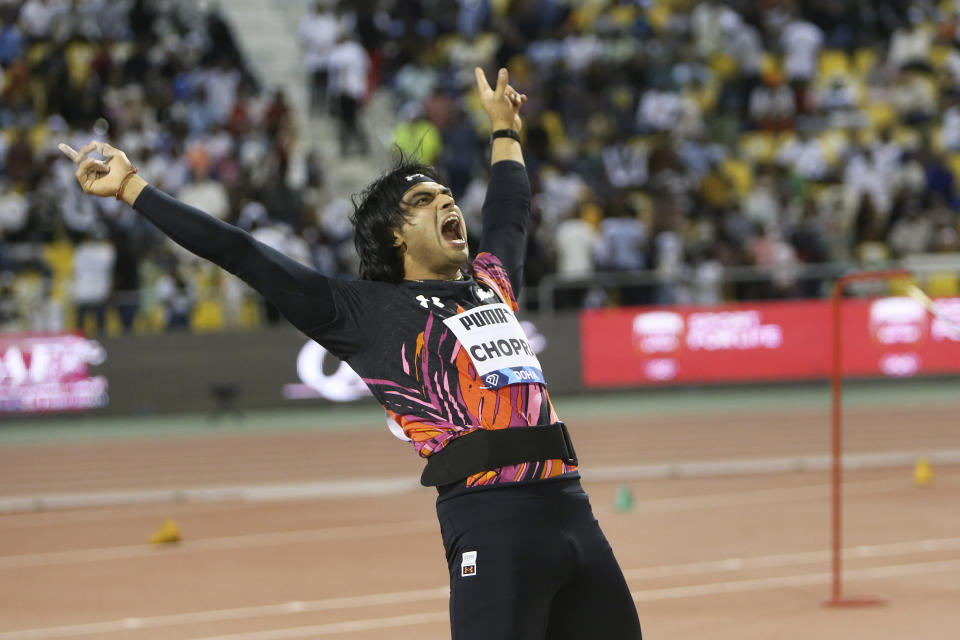 Neeraj Chopra, of India, reacts after an attempt in the men's javelin throw during the Diamond League athletics meet at the Qatar Sports Club stadium in Doha, Friday, May 10, 2024. (AP Photo/Hussein Sayed)