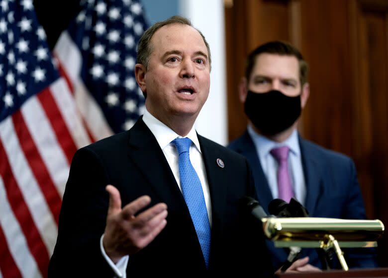 House Intelligence Committee Chairman Adam Schiff, D-Calif., left, joined by Rep. Eric Swalwell, D-Calif., speaks to reporters at a news conference with Speaker of the House Nancy Pelosi, D-Calif., at the Capitol in Washington, Wednesday, Feb. 23, 2022, where they condemned Russian President Vladimir Putin for his aggression in Ukraine. (AP Photo/J. Scott Applewhite)