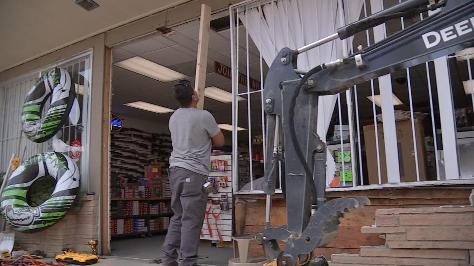 A Fall City gun shop owner jumped into action when would-be burglars rammed a stolen car into the front of his store.