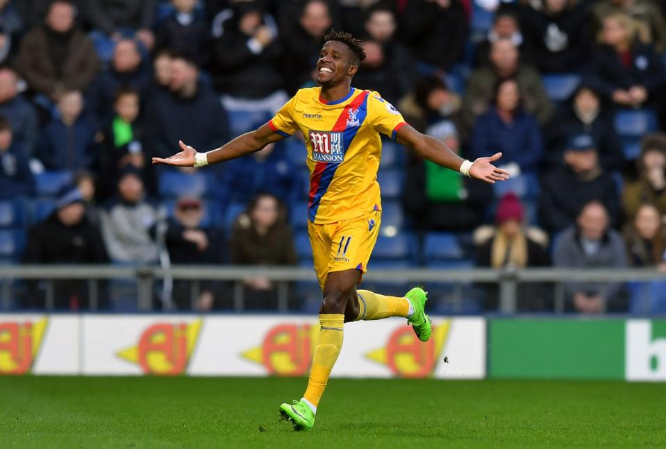 Wilfried Zaha celebrates putting Crystal Palace 1-0 up at West Brom