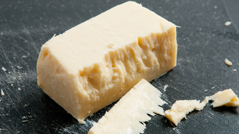 aged white cheddar cheese block