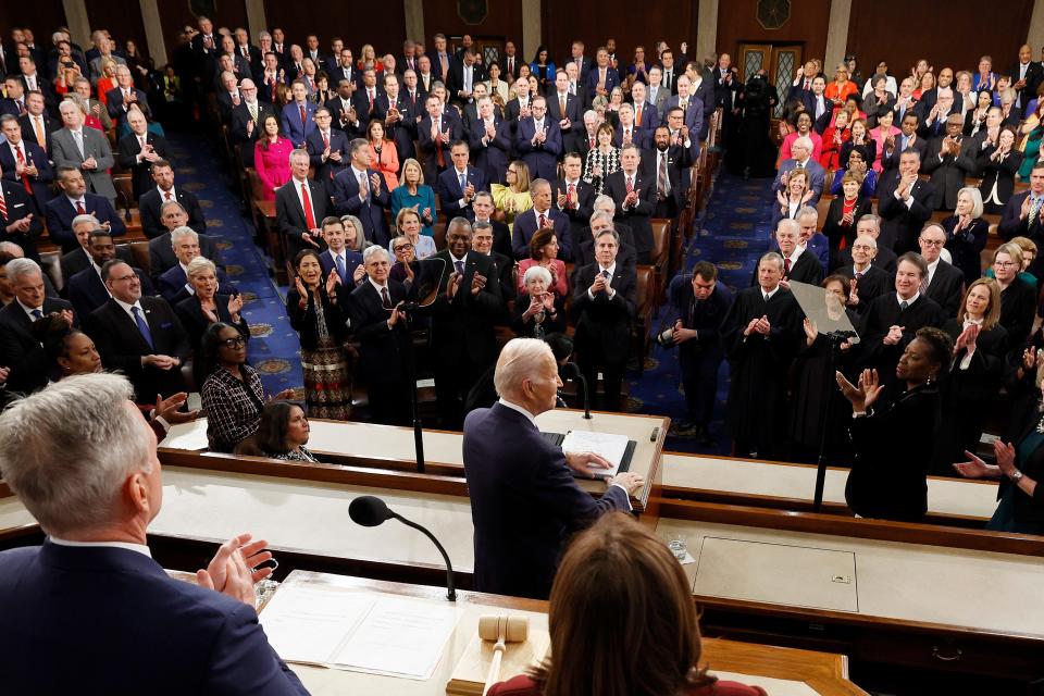 U.S. President Joe Biden delivers his State of the Union address during a joint meeting of Congress in the House Chamber of the U.S. Capitol on Tuesday in Washington, D.C. The speech marks Biden's first address to the new Republican-controlled House. Seated behind President Biden are Vice President Kamala Harris and Speaker of the House Kevin McCarthy (R-CA).