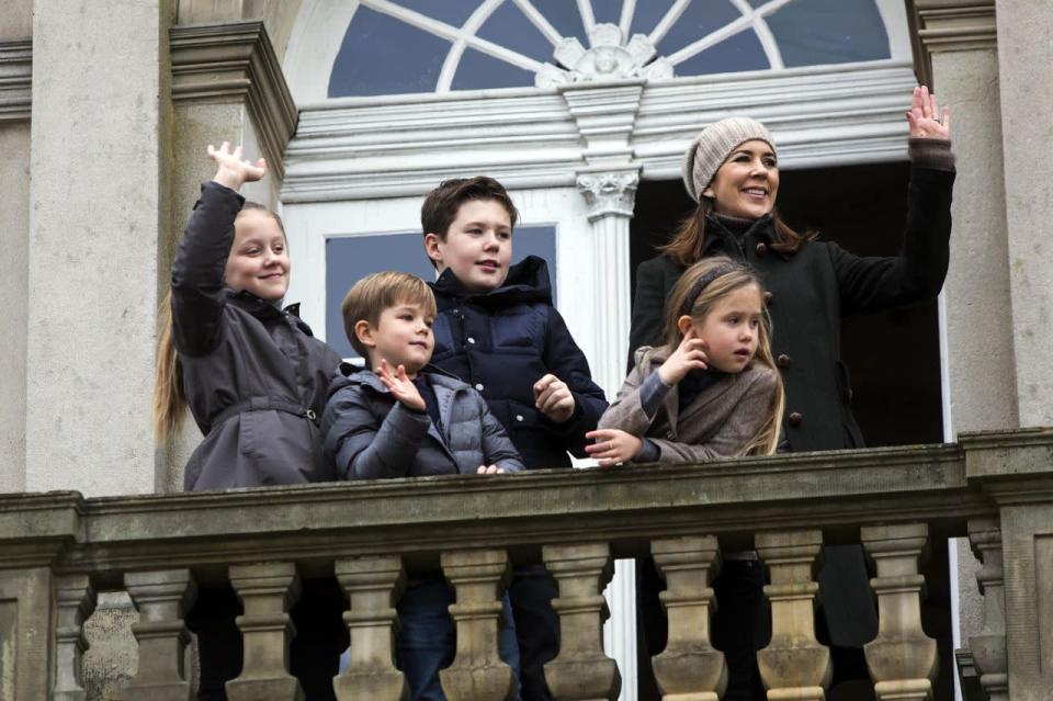<p>November 2017: Mary and her grown up children watch the annual Hubertus Hunt from their palace balcony. Photo: Getty Images.</p> 
