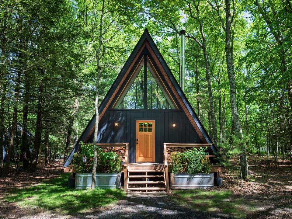 The exterior of the A-frame cabin.