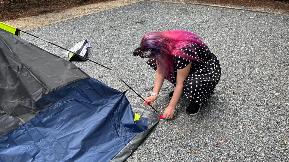 jenna clark setting up tent poles