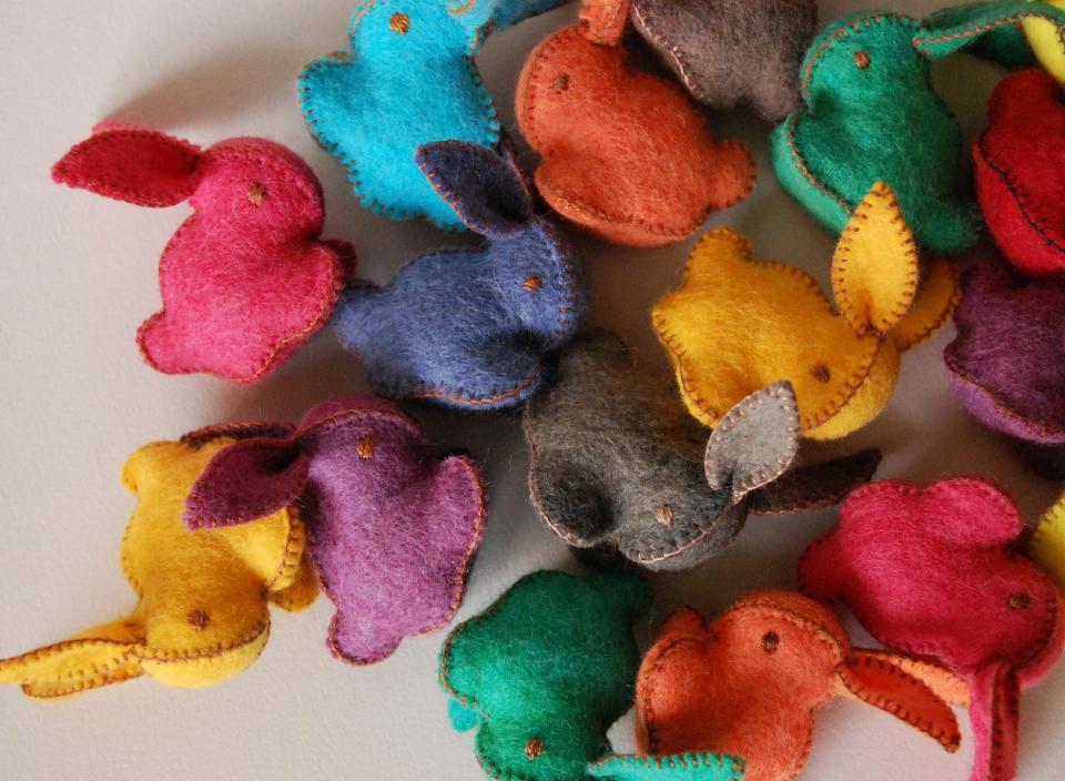 This undated publicity photo provided by Textile Platypus shows Canadian textile artist Cristina Larsen crafts winsome stuffed felted bunnies and chicks in a rainbow of hues. She uses merino wool to make all the felt, dyes the colors and stitches every toy by hand. While Larsen calls them "toys," they’d be equally at home as artsy Easter décor (www.etsy.com/shop/textileplatypus). (AP Photo/Textile Platypus, Cristina Larsen)