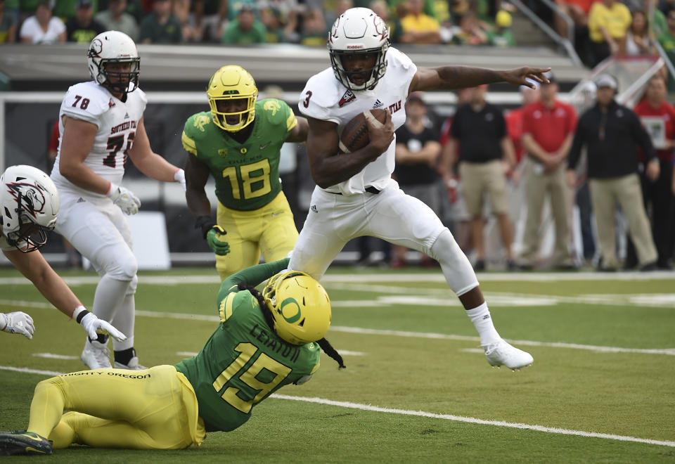 Fotu T. Leiato II (No. 19) had 37 tackles in his Oregon career. (Photo by Steve Dykes/Getty Images)