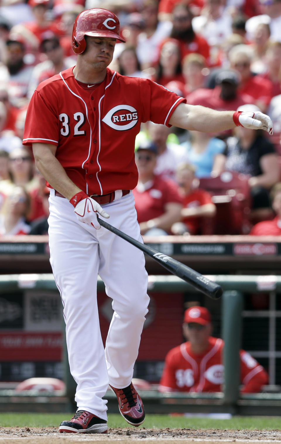 Cincinnati Reds' Jay Bruce strikes out against Tampa Bay Rays starting pitcher Alex Cobb to end the fourth inning of a baseball game, Saturday, April 12, 2014, in Cincinnati. (AP Photo/Al Behrman)