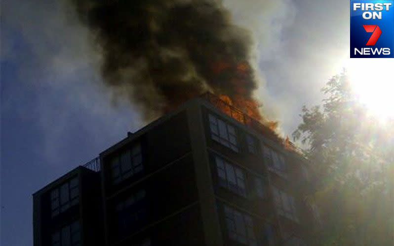 An inner-Sydney apartment building ablaze - ten metre high flames. Photo: First on 7/Laura Sparkes