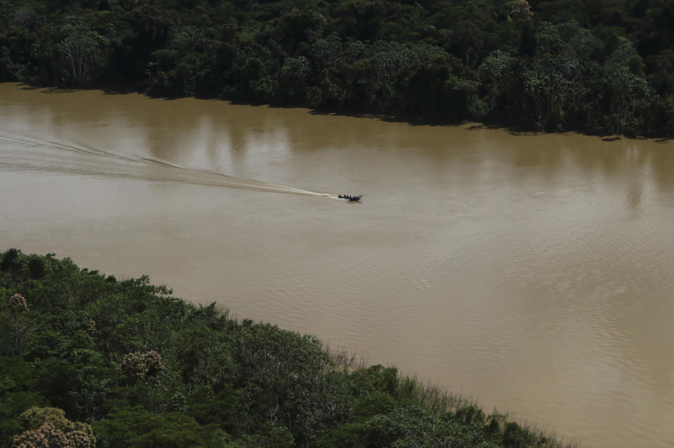 Police navigate the Itaquai River during the search for British journalist Dom Phillips and Indigenous affairs expert Bruno Araujo Pereira in the Javari Valley Indigenous territory, Atalaia do Norte, Amazonas state, Brazil, Friday, June 10, 2022. Phillips and Pereira were last seen on Sunday morning in the Javari Valley, Brazil's second-largest Indigenous territory which sits in an isolated area bordering Peru and Colombia. (AP Photo/Edmar Barros)