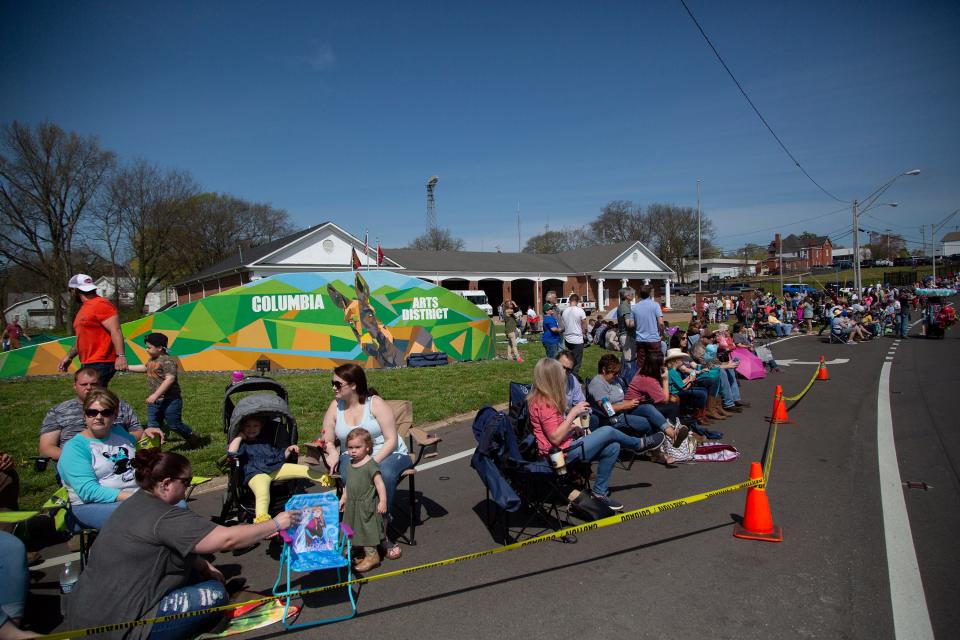 Visitors to Columbia wait for the start of the mule Day parade along Carmack Boulevard on Saturday, April 6, 2019.