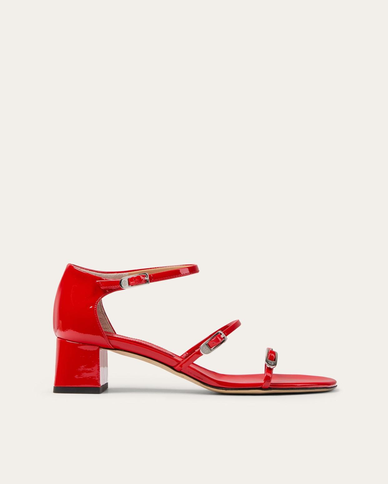 <p><a href="https://dearfrances.com/collections/sale/products/prim-sandal-red-patent" rel="nofollow noopener" target="_blank" data-ylk="slk:Shop Now;elm:context_link;itc:0;sec:content-canvas" class="link rapid-noclick-resp">Shop Now</a></p><p>Prim Sandal</p><p>dearfrances.com</p><p>$255.00</p><span class="copyright">Dear Frances</span>