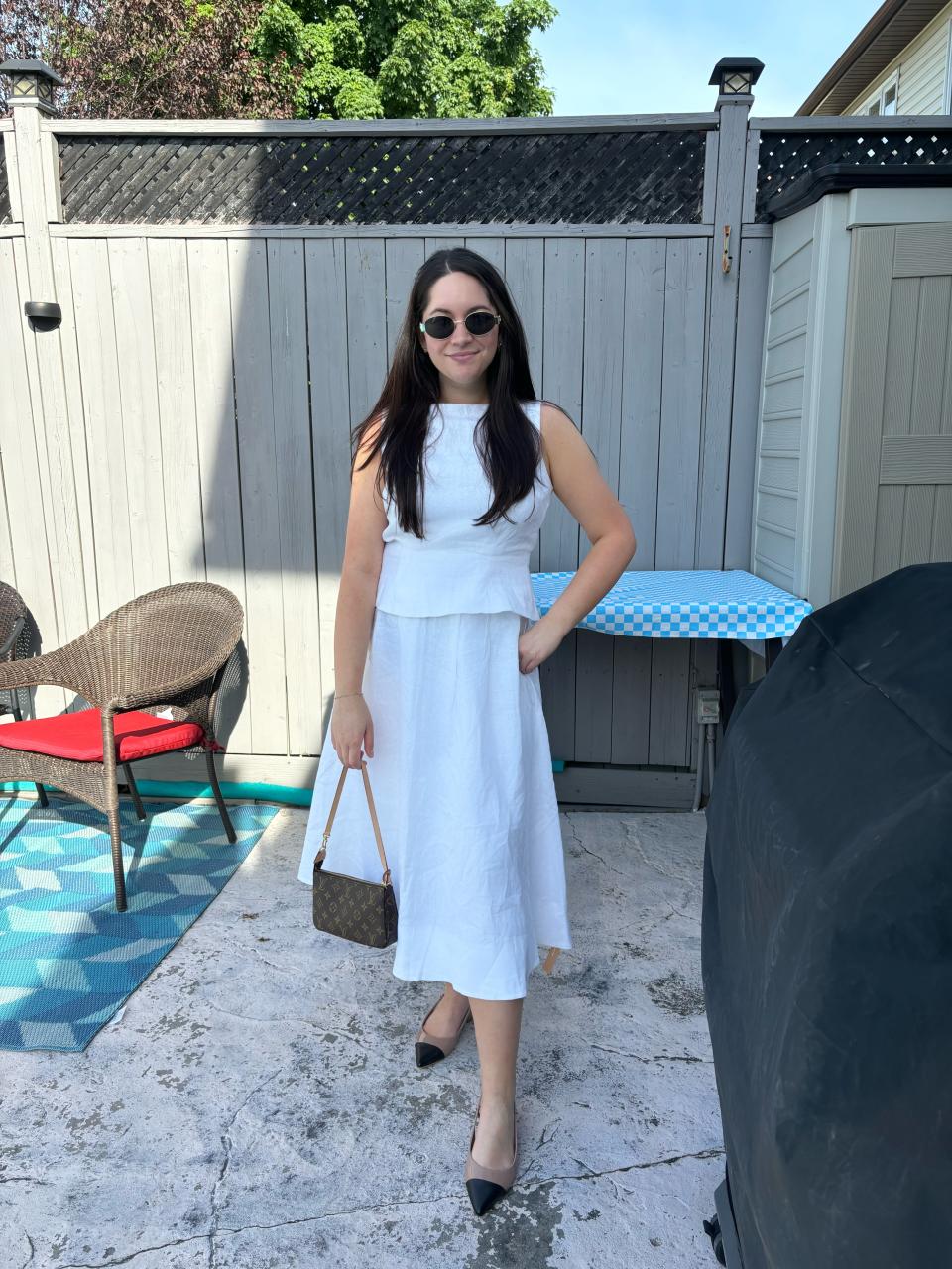 Melina wearing the Reformation Moya Linen Two Piece Set