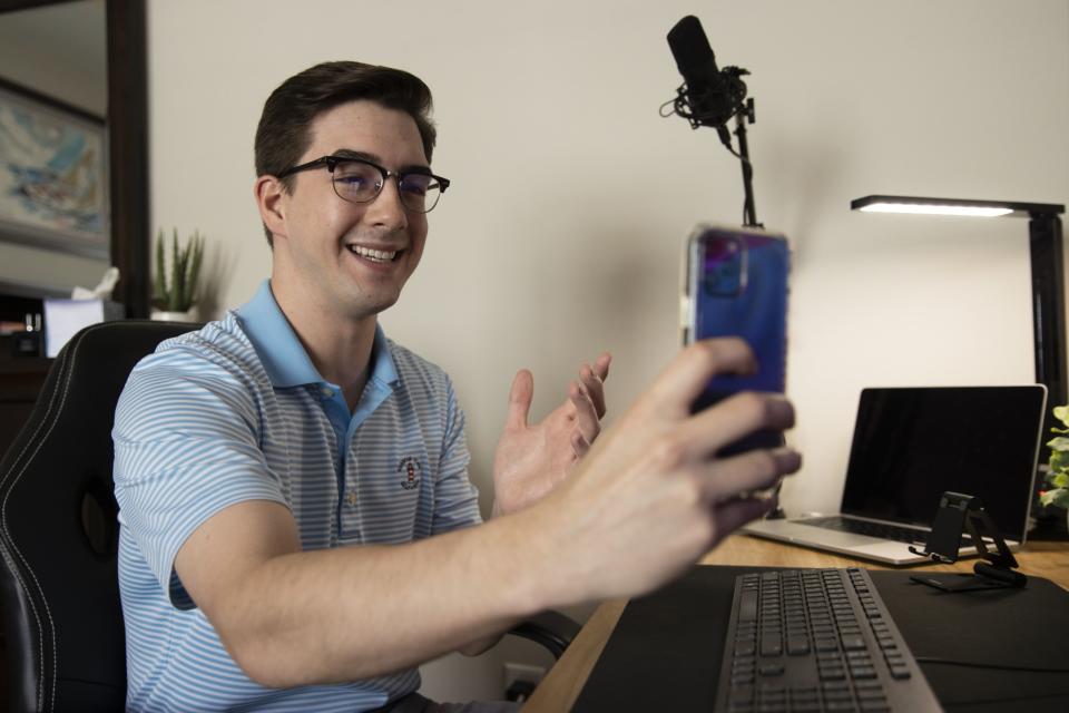 Austin Hankwitz shares videos on social media platforms to a new generation of investors. (PHOTO: Brett Carlsen/Bloomberg)