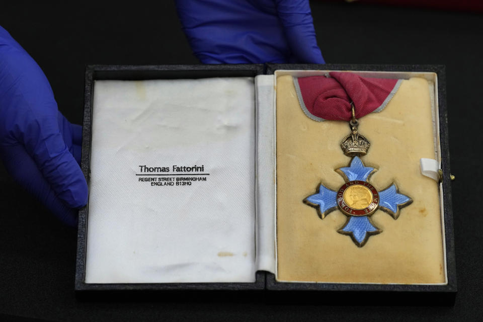 A CBE medal awarded to Professor Stephen Hawking which has been acquired by the Science Museum Group, in London, Wednesday, May 26, 2021. Science Museum Group and Cambridge University Library will announce that they have acquired the historic contents of Professor Stephen Hawking's office (going to SMG) and his archive (going to CUL). (AP Photo/Kirsty Wigglesworth)