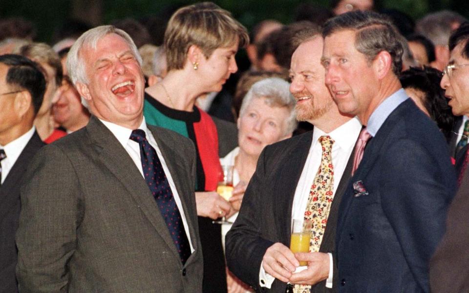 Patten shares a joke with former foreign secretary Robin Cook and Prince Charles during the last reception to be held by a British official in Hong Kong - John Stillwell