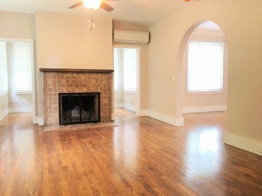 The living room is shown at the West apartment at 4039 Kingston Pike.