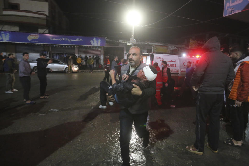 Palestinians wounded in tyhe Irsaeli bombardment of the Gaza Strip arrive to a hospital in Rafah on Wednesday, Dec. 13, 2023. (AP Photo/Hatem Ali)