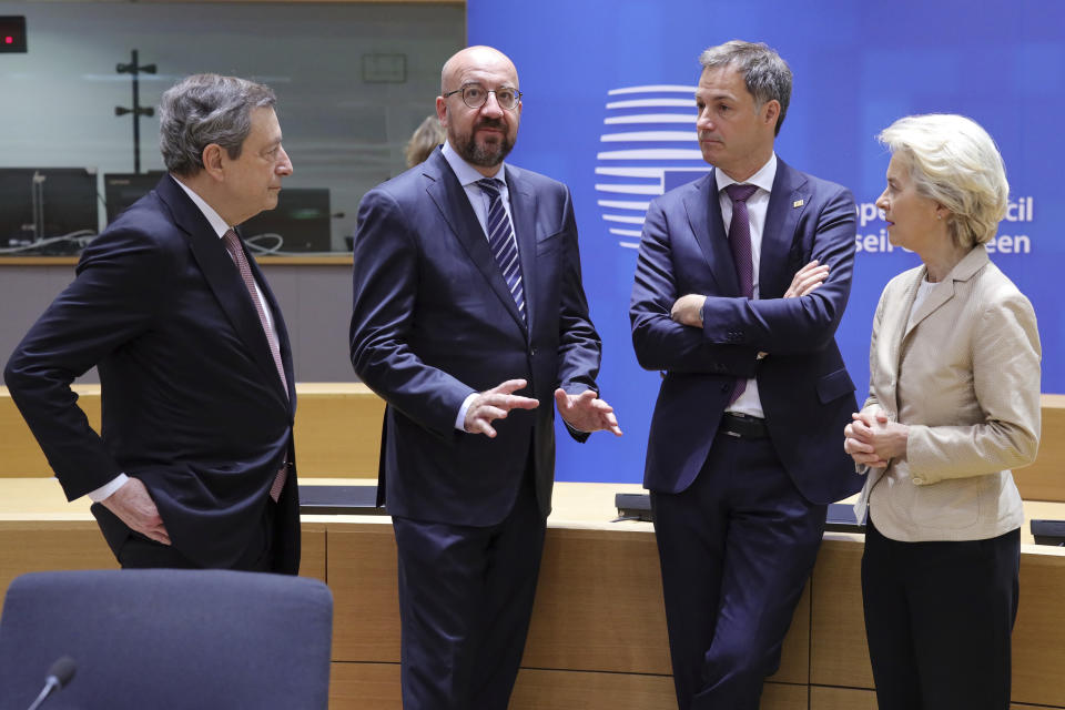 From left: Italian Premier Mario Draghi, European Council President Charles Michel, Belgium's Prime Minister Alexander de Croo and European Commission President Ursula von der Leyen talk before the second day's session of an extraordinary meeting of EU leaders to discuss Ukraine, energy and food security at the Europa building in Brussels, Tuesday, May 31, 2022. (AP Photo/Olivier Matthys)