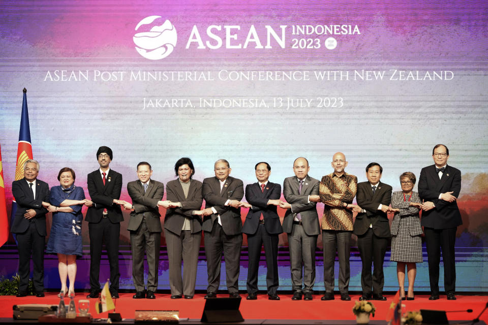 New Zealand's Foreign Minister Nanaia Mahuta, fifth left, Brunei's Second Minister of Foreign Affair Erywan Yusof, sixth left, and Vietnam's Foreign Minister Bui Thanh Son, seventh left, pose for a group photo with senior official leaders, from left to right, Amran Mohamed Zin of Malaysia, Theresa P. Lazaro of the Philippines, Rajpal Singh of Singapore, Kung Phoak of Cambodia, Sidharto Suryodipuro of Indonesia, Bovonethat Douangchak of Laos, Elisa da Silva of East Timor and ASEAN Deputy Secretary General Michael Tene during the ASEAN Post Ministerial Conference with New Zealand at the Association of Southeast Asian Nations (ASEAN) Foreign Ministers' Meeting in Jakarta, Indonesia, Thursday, July 13, 2023. (AP Photo/Achmad Ibrahim, Pool)