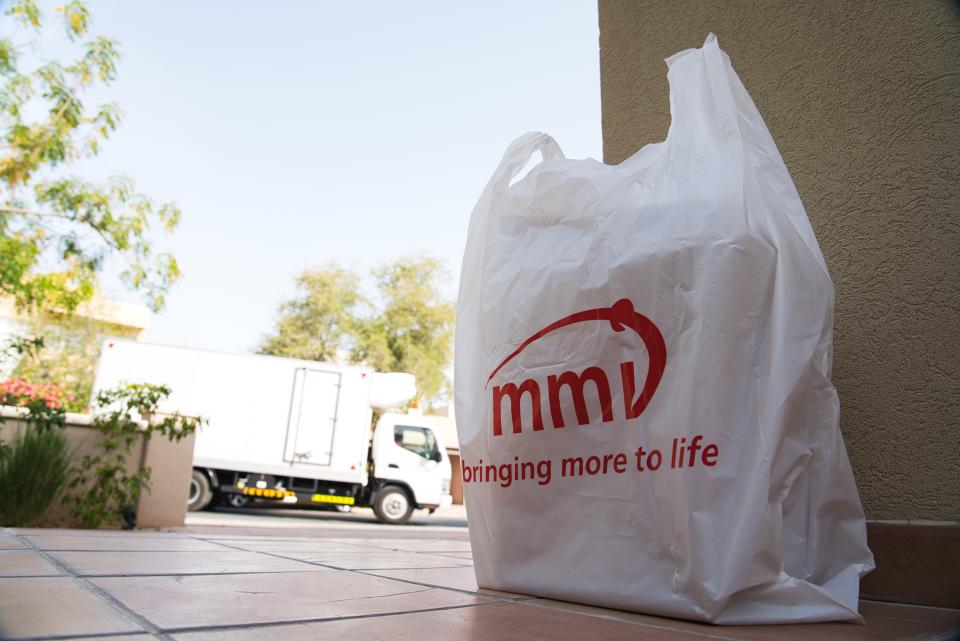 In this Tuesday, April 7, 2020 photo, a delivery truck leaves after dropping off alcohol to a home in Dubai, United Arab Emirates. Dubai’s two major alcohol distributors have partnered to offer home delivery of beer, spirits and wine as the new coronavirus now threatens a crucial source of tax and general revenue for the rulers of this Islamic city-state. The decision marks yet another loosening of social mores in the skyscraper-studded desert metropolis. (AP Photo/Jon Gambrell)