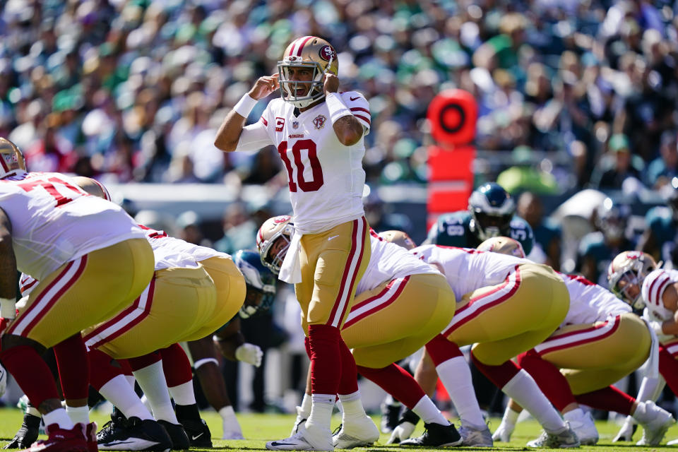 San Francisco 49ers quarterback Jimmy Garoppolo (10) calls out to his team during the first half of an NFL football game against the Philadelphia Eagles on Sunday, Sept. 19, 2021, in Philadelphia. (AP Photo/Matt Rourke)