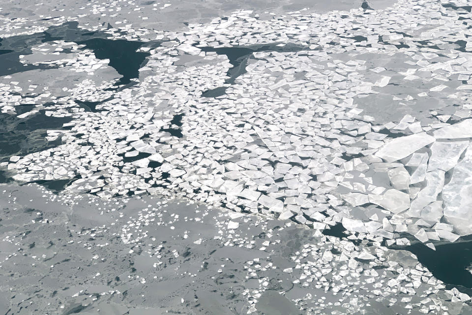 In this Feb. 14, 2019, photo, sheets of ice float in Norton Sound near the Native Village of St. Michael, Alaska, population 400. Transportation in the area is limited to air travel. (AP Photo/Wong Maye-E)