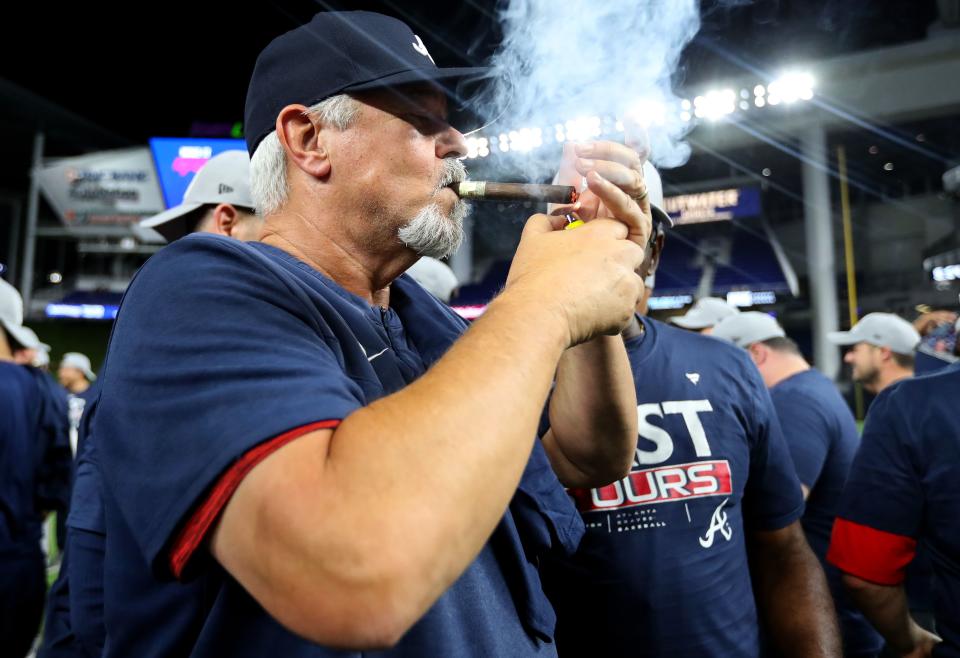 MIAMI, FLORIDA - OCTOBER 04: Rick Kranitz #39 of the Atlanta Braves celebrates after defeating the Miami Marlins and clinching the division at loanDepot park on October 04, 2022 in Miami, Florida. (Photo by Megan Briggs/Getty Images)