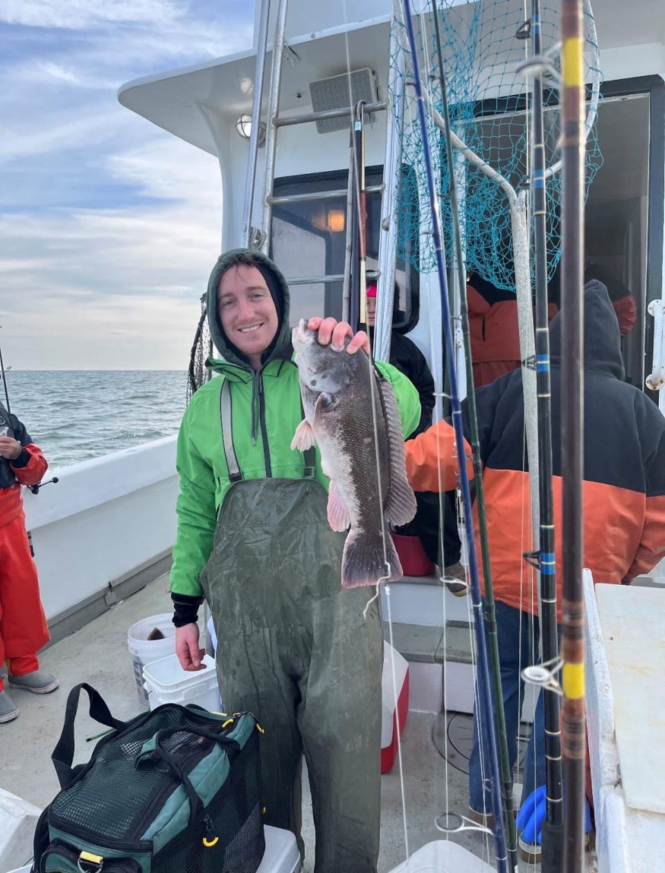 Chris Mullen of Point Pleasant holds up a 3.9-pound blackfish he caught fishing on the Mimi VI charter boat on Thanksgiving morning.