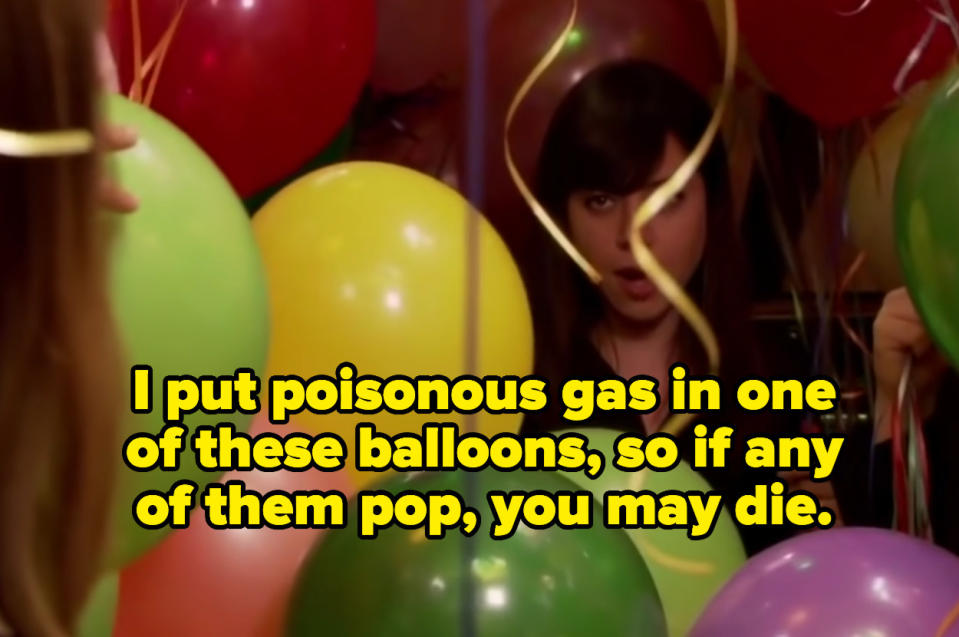 april ludgate surrounded by balloons