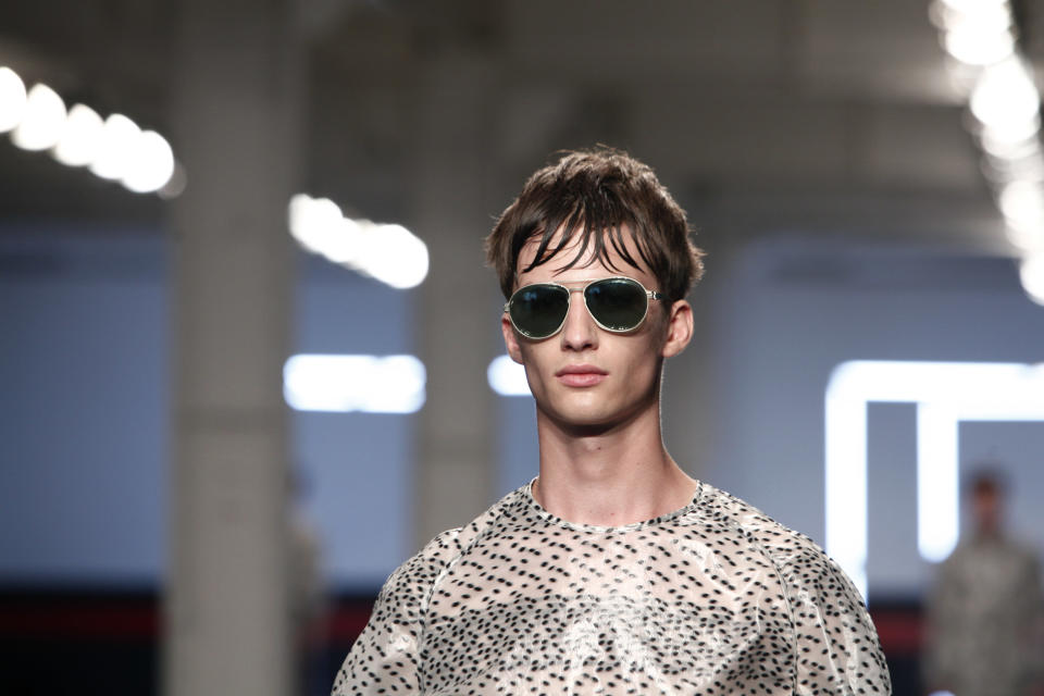 A model presents a creation by German fashion designer Damir Doma as part of his men's fashion Spring-Summer 2014 collection, presented Saturday, June 29, 2013 in Paris. (AP Photo/Thibault Camus)